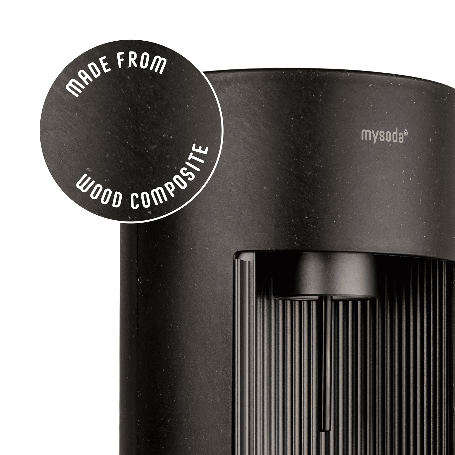 Glassy black sparkling water maker with a close-up bubble showing the subtly visible wood fibres on the device's surface