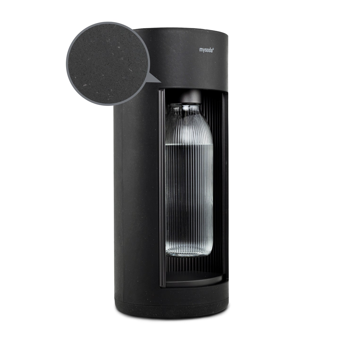 Glassy black sparkling water maker with a close-up bubble showing the subtly visible wood fibres on the device's surface