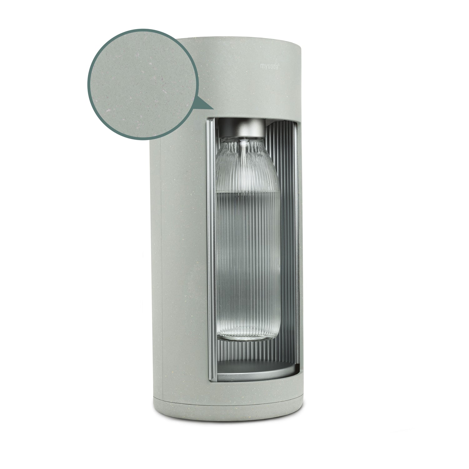 Glassy pigeon (green) sparkling water maker with a close-up bubble showing the subtly visible wood fibres on the device's surface