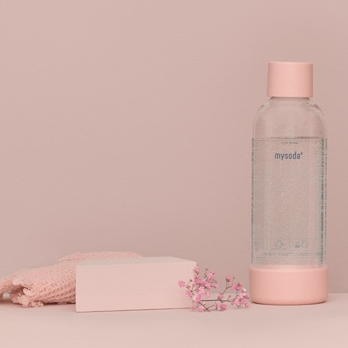 A pink water bottle for Mysoda soda makers in tone-to-tone setting