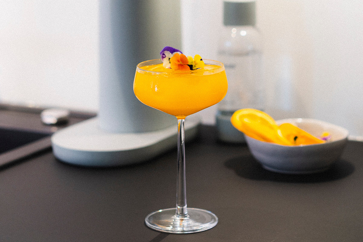 Betoverende mango-oranje mocktail