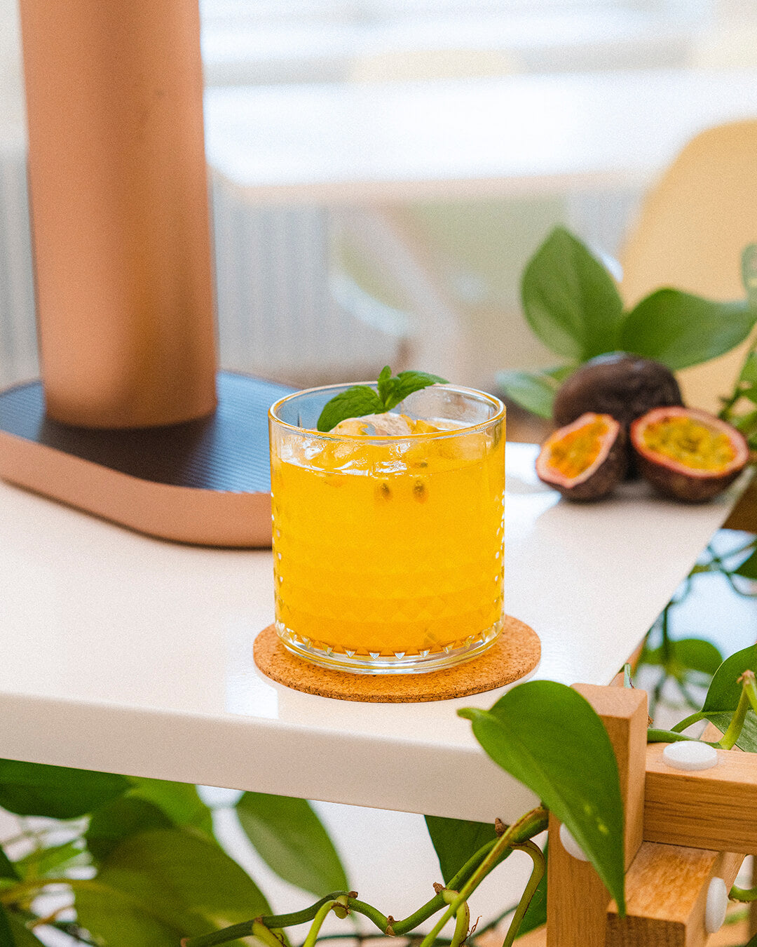 A glass of passion fruit tangerine mocktail