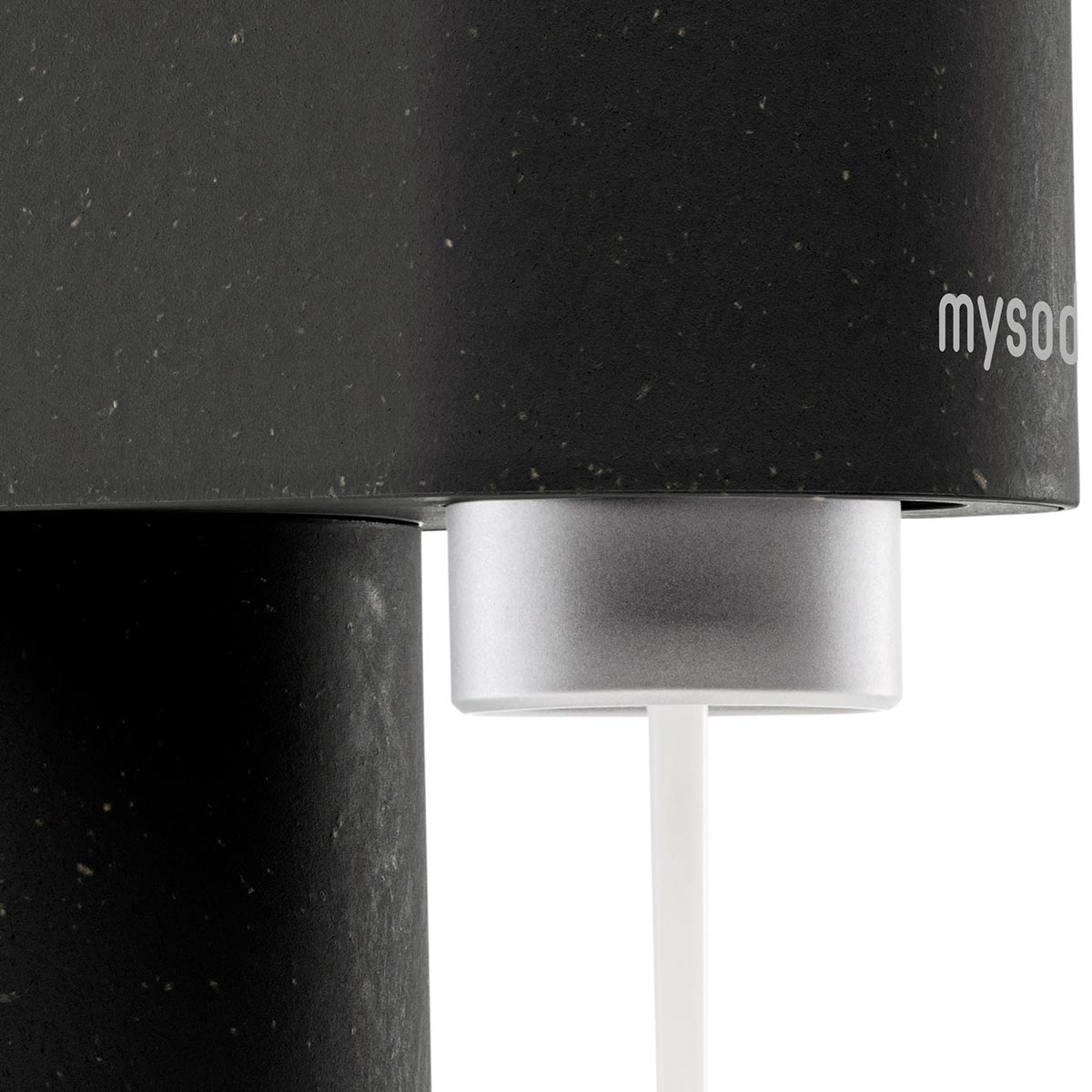 A close-up of a black Mysoda Woody sparkling water maker