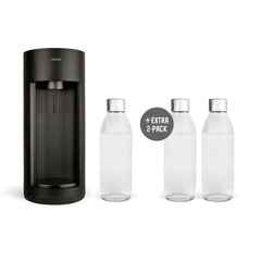 A black Glassy sparkling water maker and three glass bottles