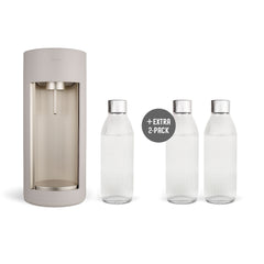 A clay-coloured Glassy sparkling water maker and three glass bottles