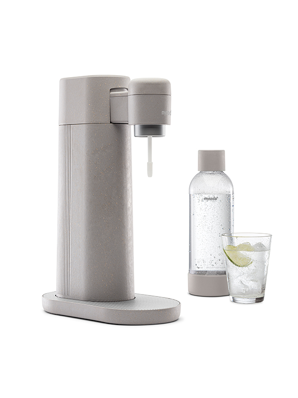 A Mysoda Toby sparkling water maker, colour dove, with bottle and a glass of water viewed from the side.