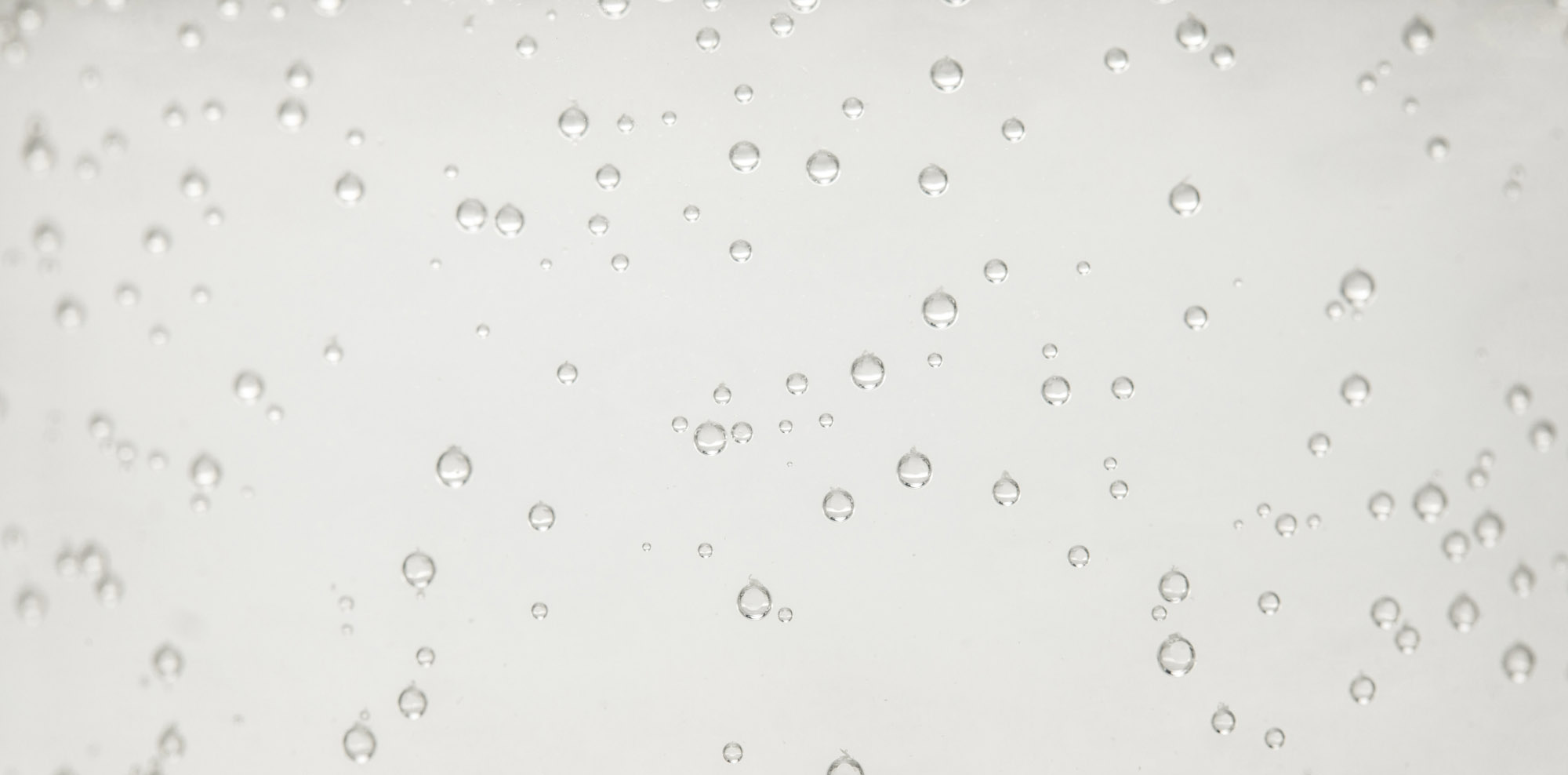 A close-up of bubbles in sparkling water